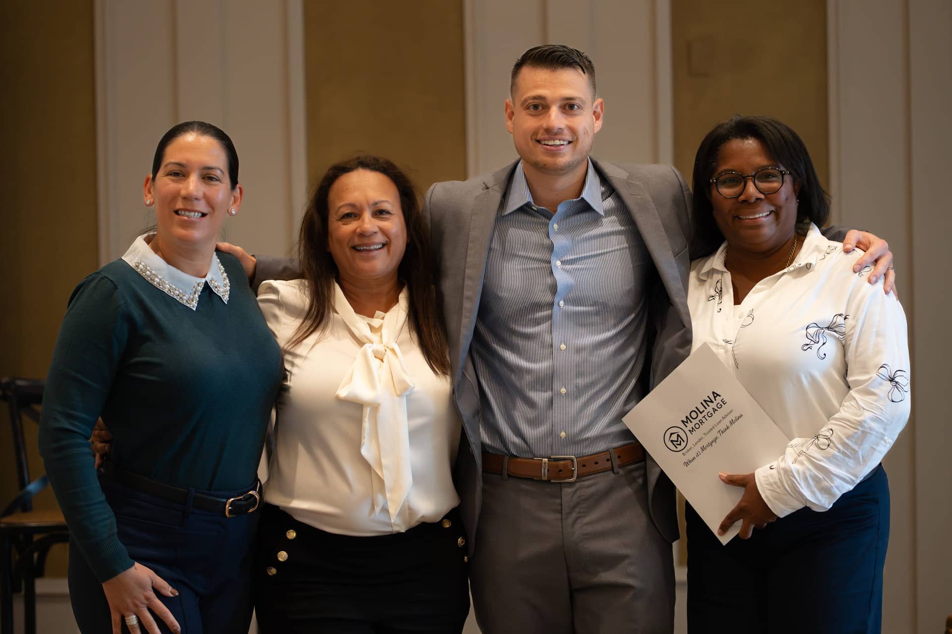 Christopher Molina with partner agents after a Molina Mortgage masterclass