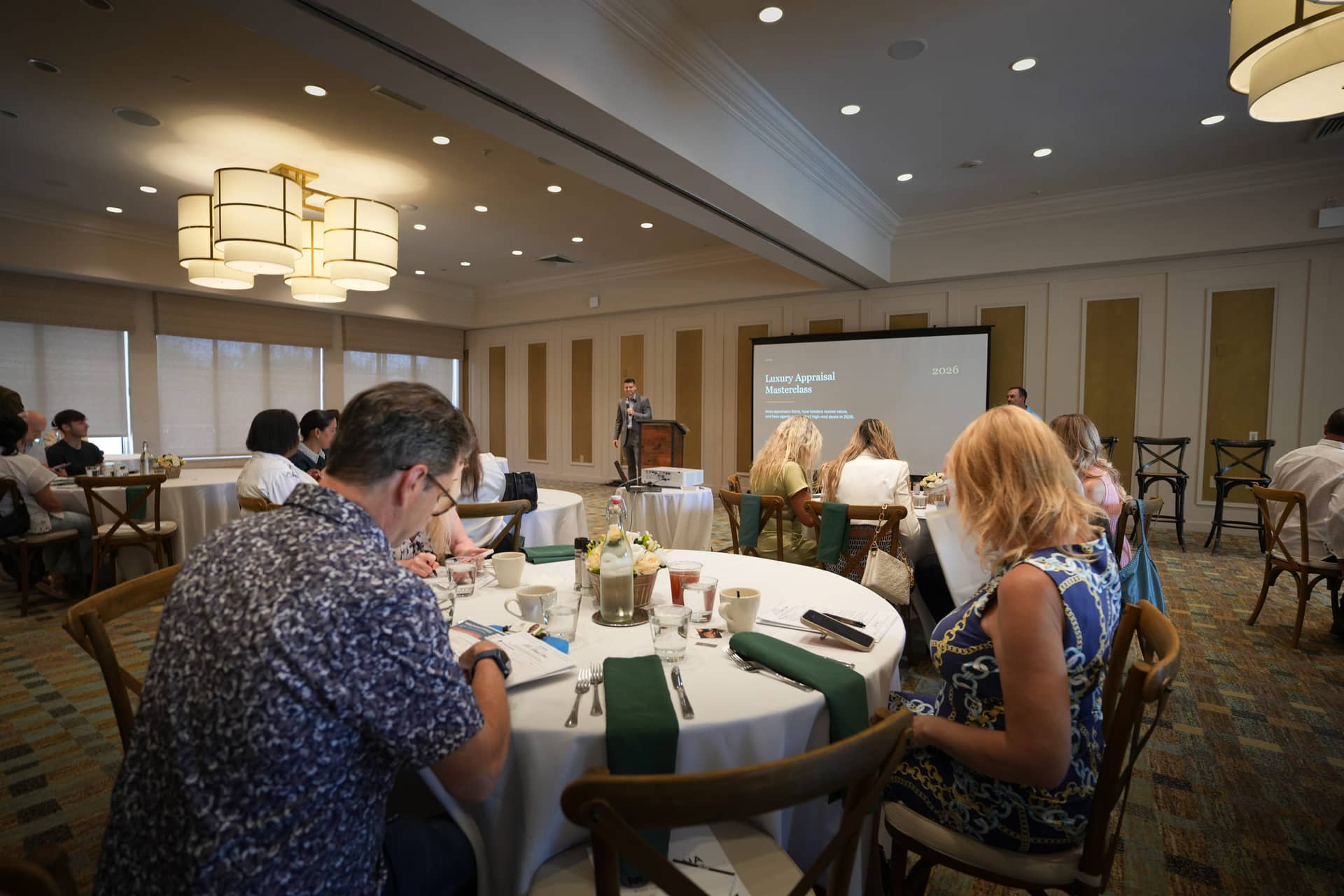 A full room of real estate agents at the Luxury Appraisal Masterclass